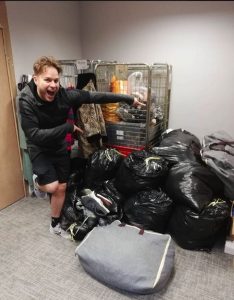 Olly-Murs-donating-clothes-to-St-Clare-Hospice-shop